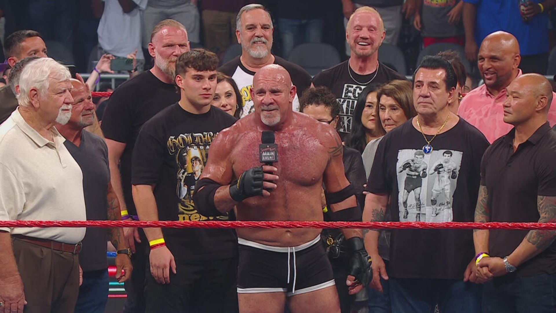 Goldberg was surrounded by friends and family after the match [Image: WWE.com]