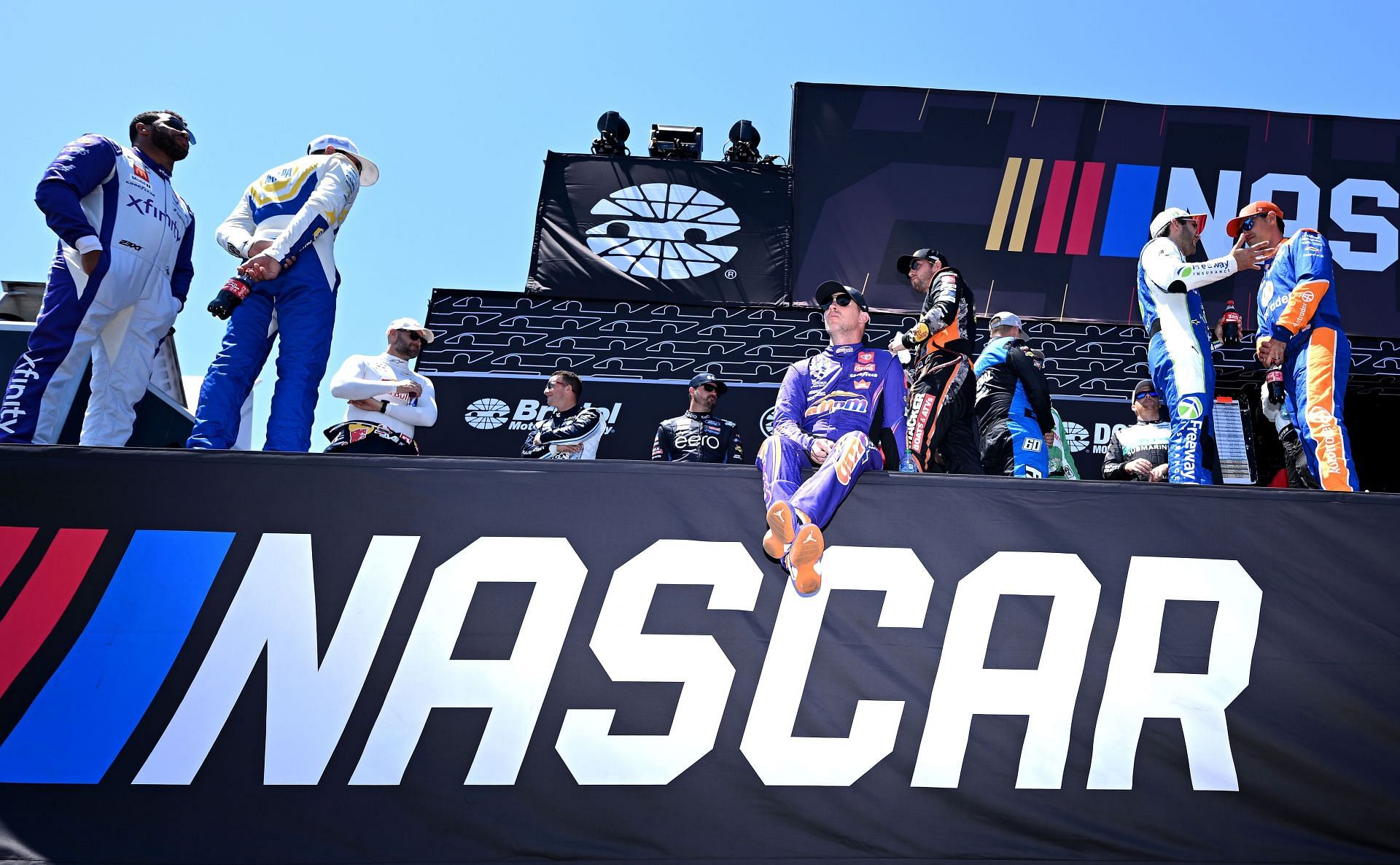 Denny Hamlin, along with other drivers, waits for driver introductions at Sonoma. Source: Getty