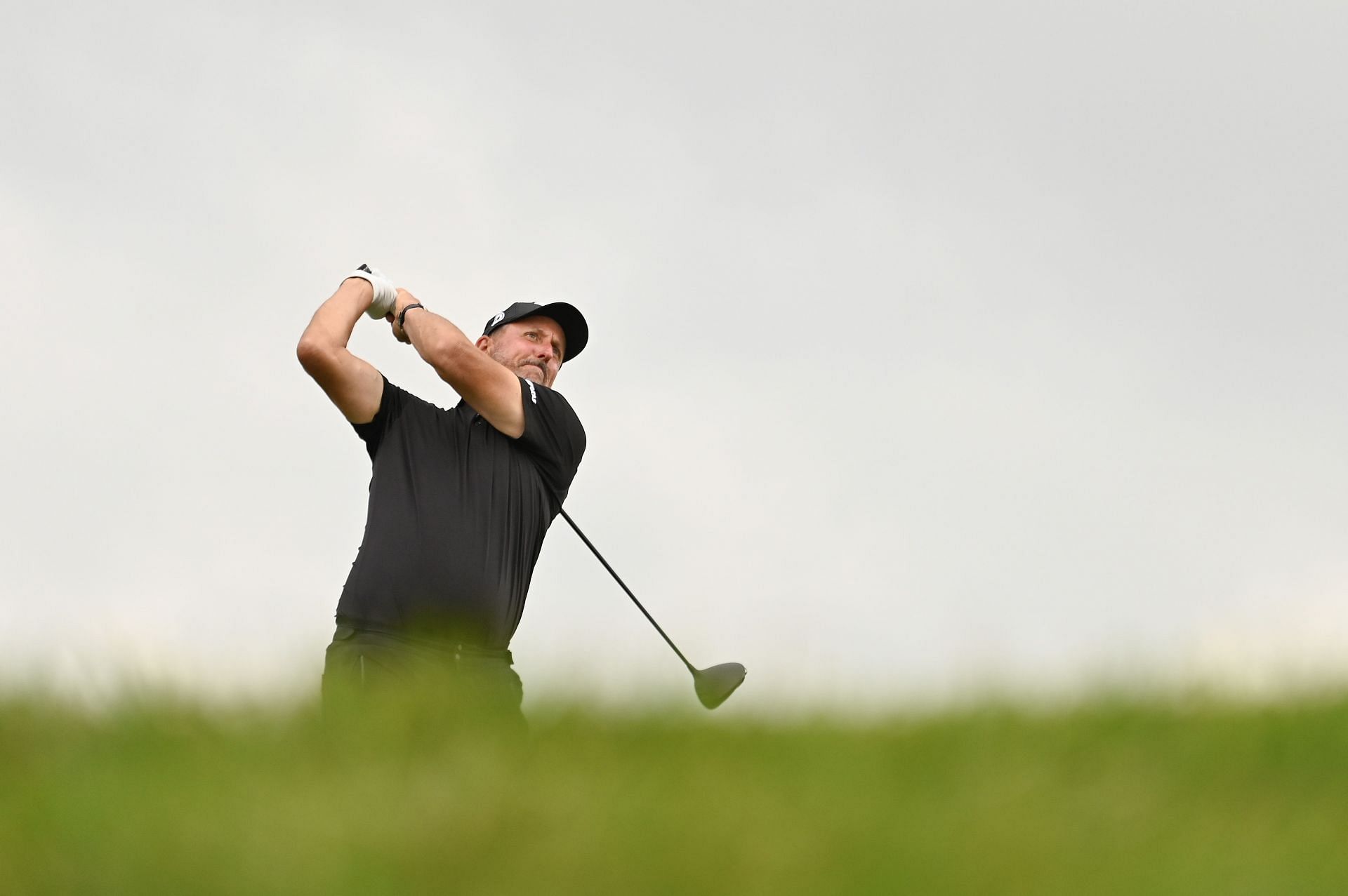 Phil Mickelson of HighFlyers GC tees off at the 17th hole on day three of LIV Golf Virginia at Robert Trent Jones Golf Club (Image Source: Getty)
