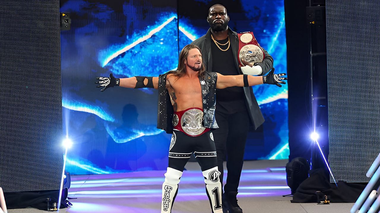 Styles and Omos (via WWE
