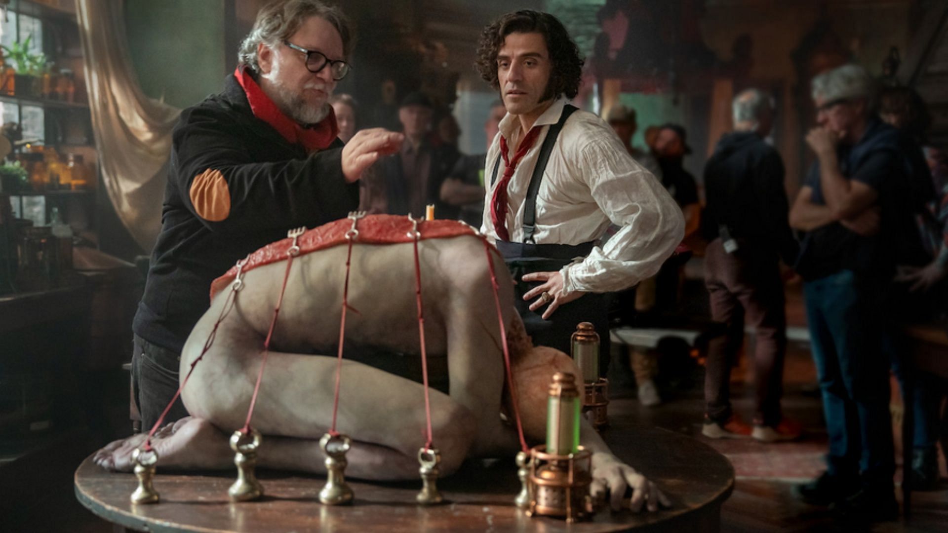 Director Guillermo del Toro and Oscar Isaac on the set of Frankenstein 2025, constructing the Creature amid a setting that fuses science and myth. (Image via Netflix)