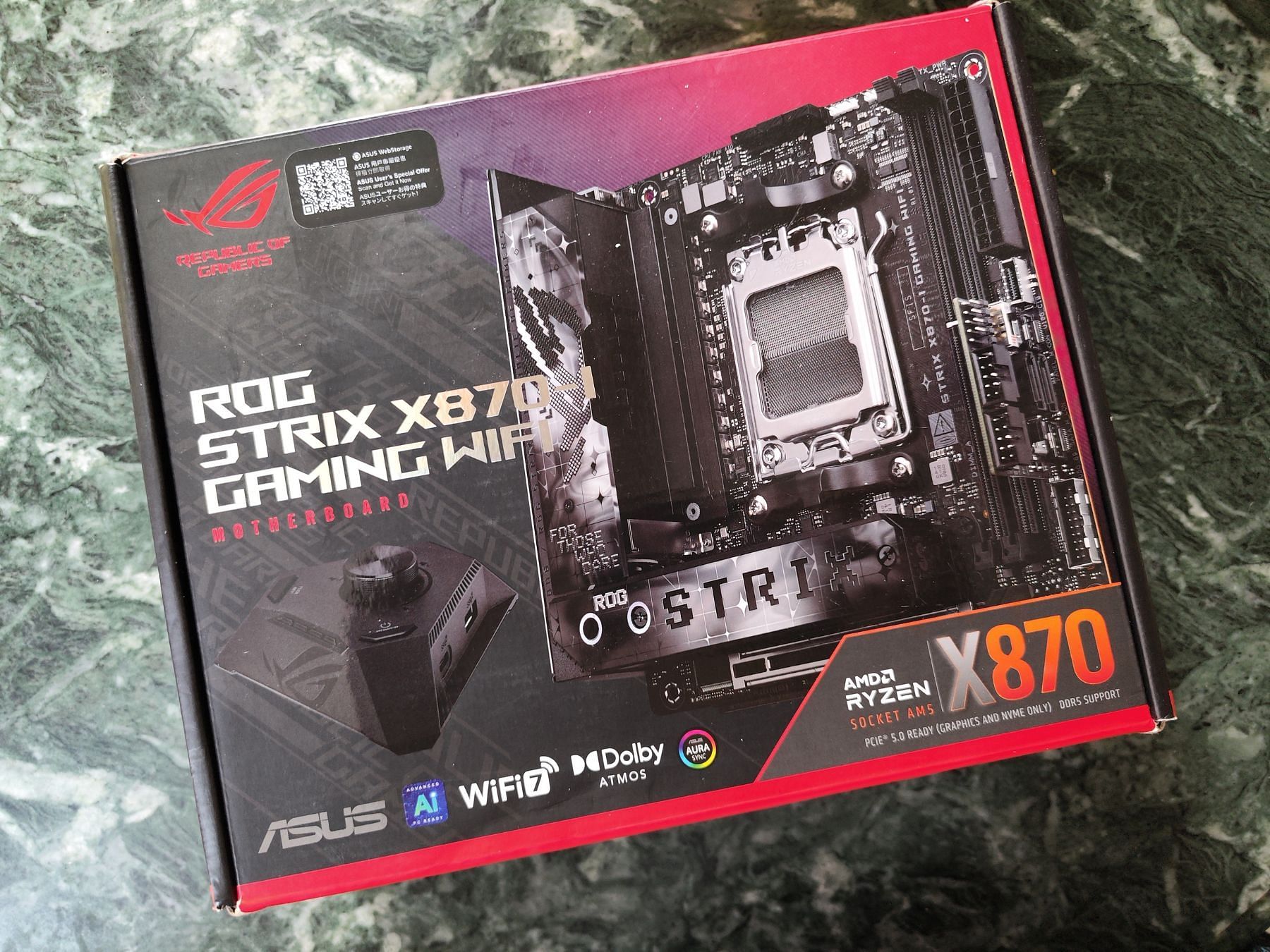 The ROG Strix X870-I comes in a stylish package with a bunch of accessories in the box (Image via Sportskeeda)