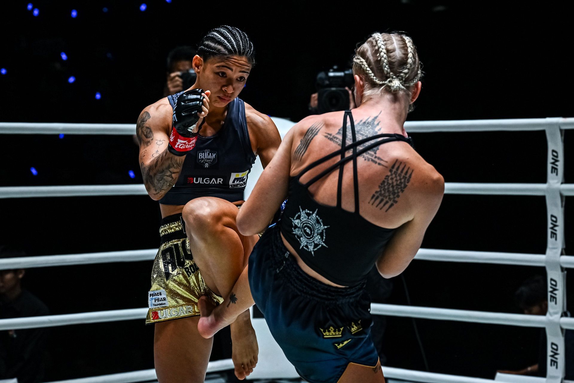 (From left) Allycia Hellen Rodrigues and Johanna Persson in action at ONE Fight Night 33. [Image courtesy from ONE Championship]