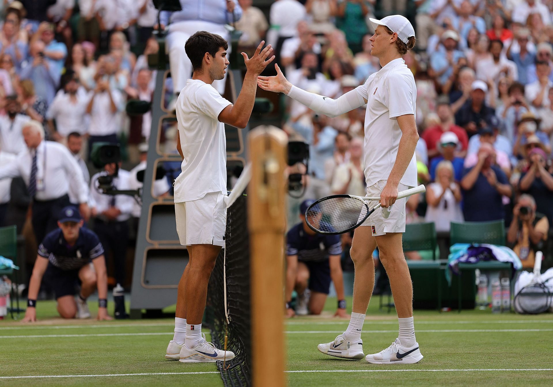 Carlos Alcaraz (left) and Jannik Sinner (right) after the conclusion of the men&#039;s singles final at the 2025 Wimbledon Championships (Source: Getty)