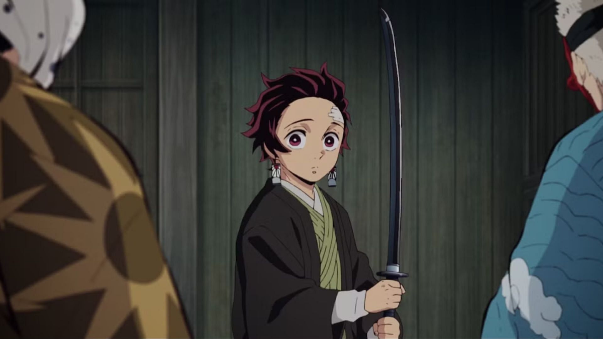Tanjiro with his black Nichirin sword (Image via Ufotable)