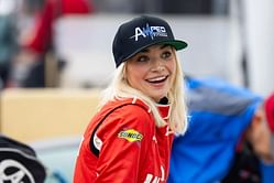 Natalie Decker styles a pink swimsuit as she shares a kiss with husband Derek Lemke on the couple’s boating excursions