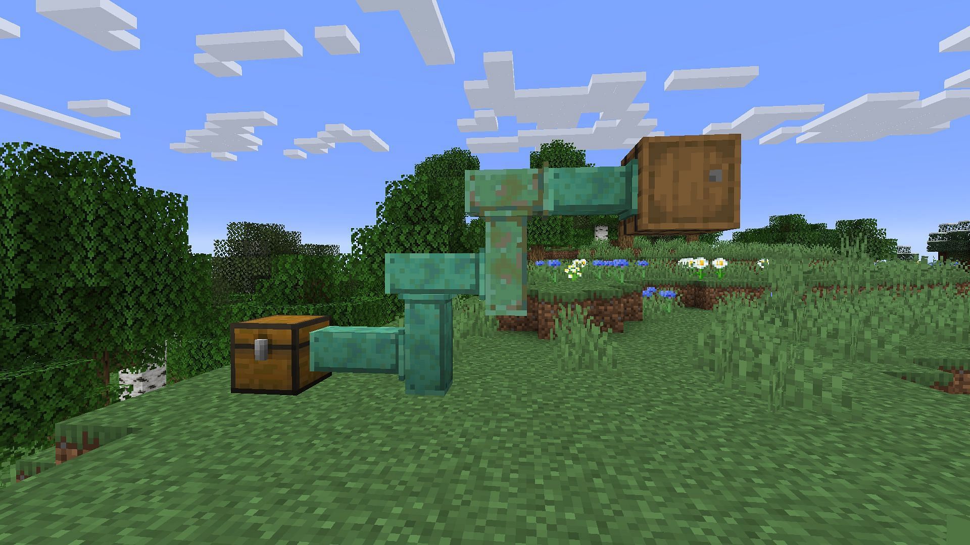 This mod adds unique copper pipe blocks that can transfer items from one point to another (Image via CurseForge/AViewFromTheTop)