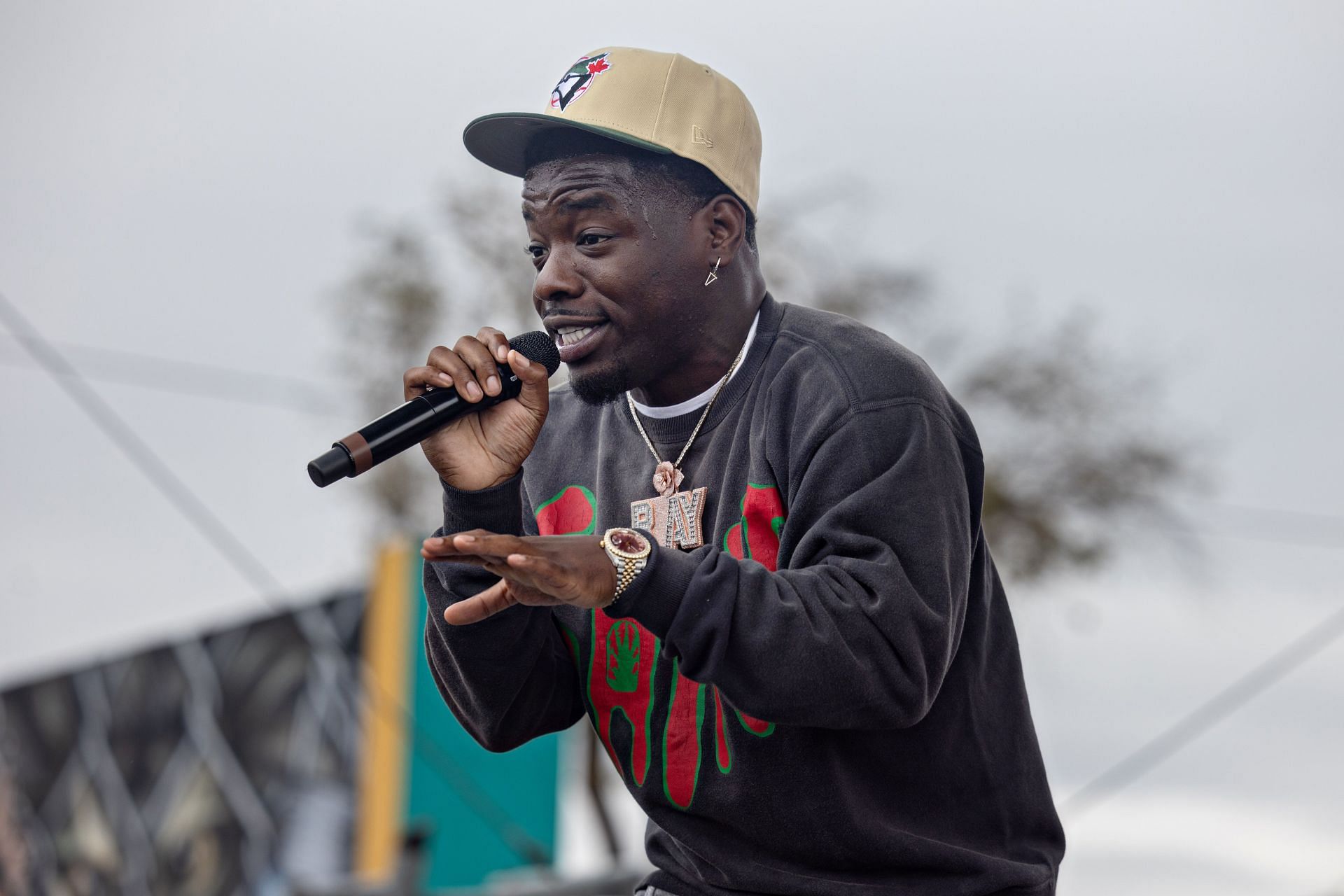 Ray Vaughn at Top Dawg Entertainment (TDE) throws its 10th annual toy drive and concert featuring SZA, Jay Rock, YG and other TDE artists performing, followed by a gift giveaway to kids in the Nickerson Gardens housing projects (Image Source: Getty)