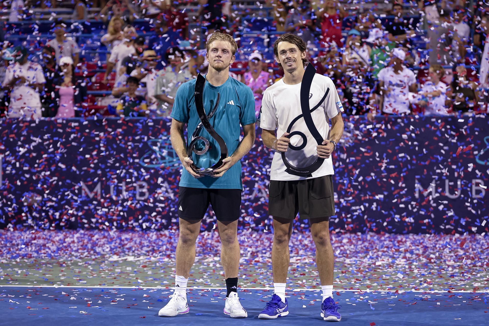 Alejandro Davidovich Fokina (left) and Alex de Minaur (right) pose with the men&#039;s singles runner-up and winner&#039;s trophies, respectively, at the 2025 Mubadala Citi DC Open (Source: Getty)