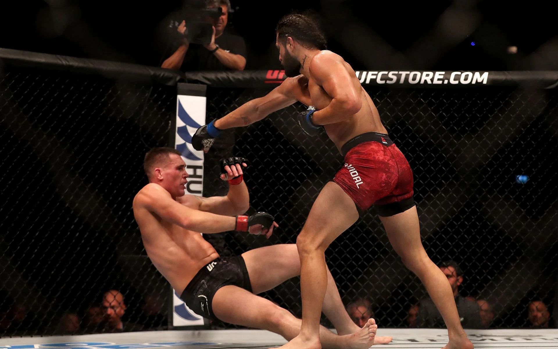 Darren Till (left) makes a lighthearted remark about his knockout defeat against Jorge Masvidal (right). [Image courtesy: Getty]