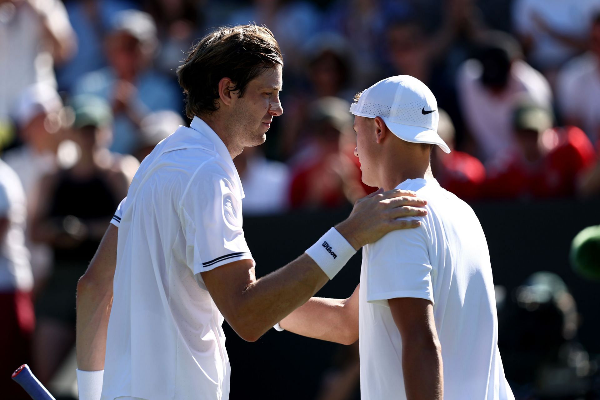 Nicolas Jarry (left) and Holger Rune (right) after the conclusion of their first-round clash at the 2025 Wimbledon Championships (Source: Getty)
