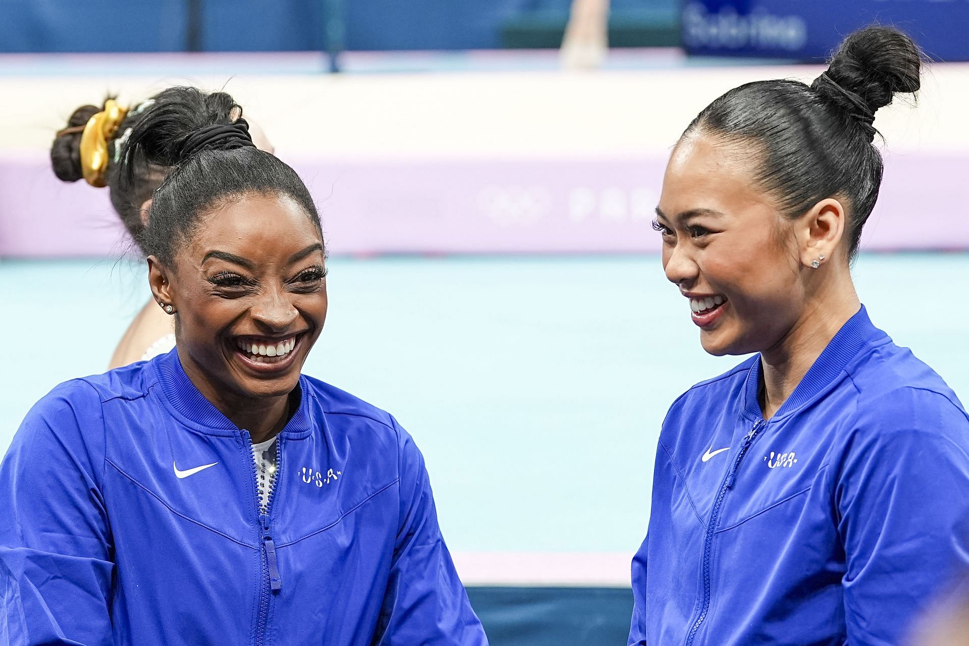 Simone Biles (L) and Suni Lee of the United States at the Olympic Games 2024 in Paris, France. (Photo by Getty Images)