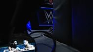Screenshot of the moment a boot appeared along with some wires in a big botch (Credit: WWE SmackDown on Netflix)