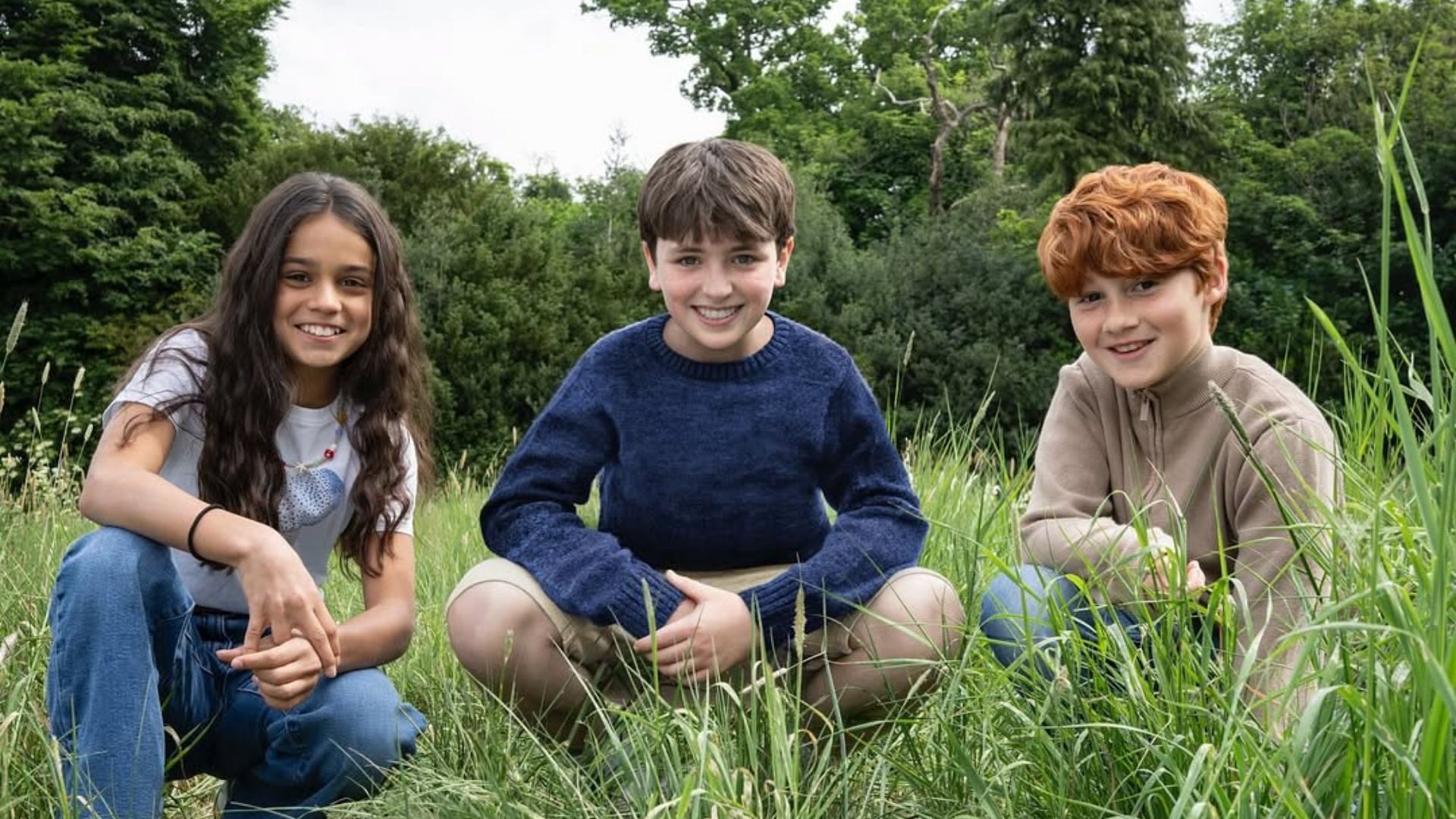 A still of the main cast