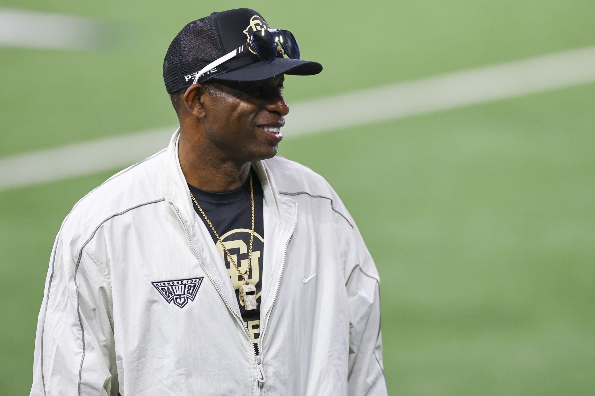Ambitious grandpa Deion Sanders goes recruiting for a swim coach to train infant grandson, baby Snow, via latest IG post