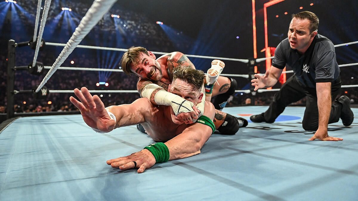 CM Punk and John Cena at Night of Champions (Photo credit: WWE.com)