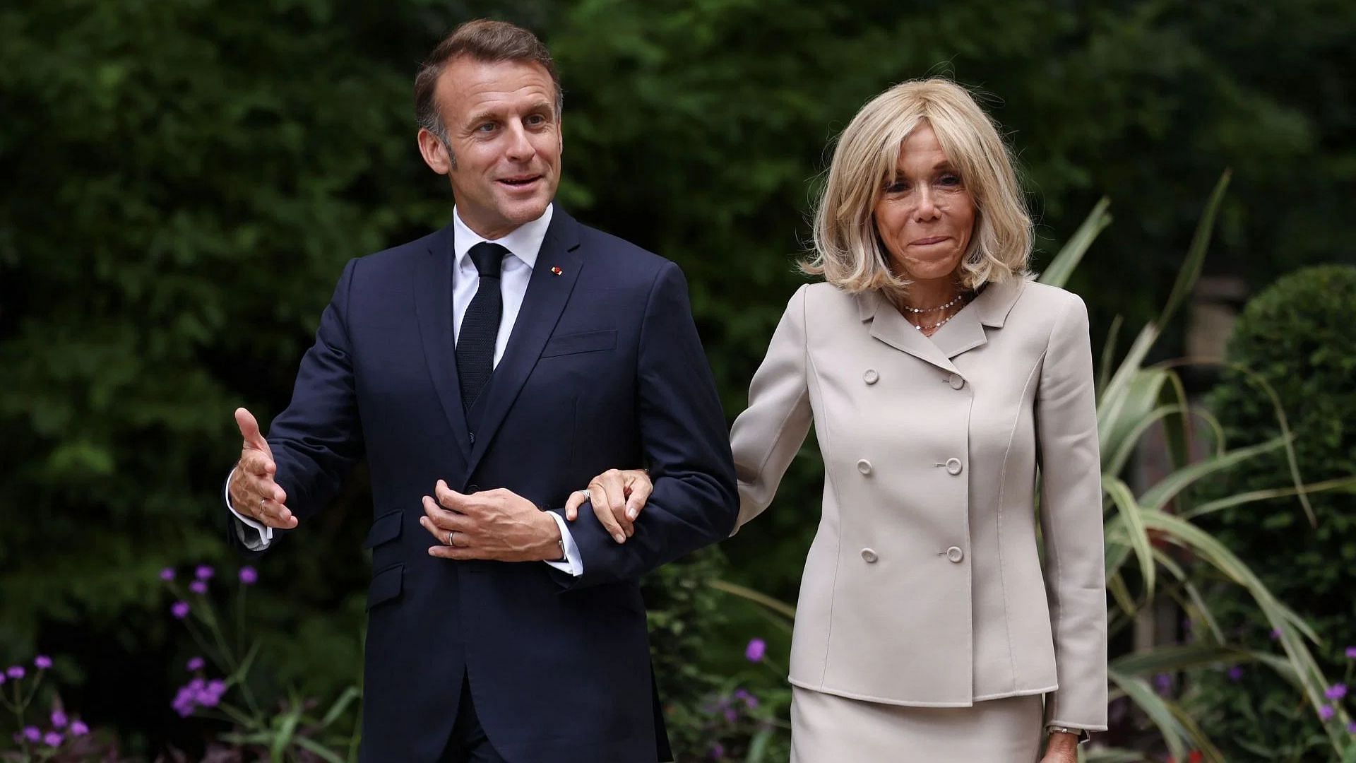 French President Emmanuel Macron and his wife Brigitte Macron arrive in Downing Street on July 9, 2025 in London, England (Image via Getty)