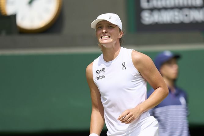 WATCH: Iga Swiatek tells fans not to snitch in adorable Wimbledon moment as she continues hoarding towels after reaching SF
