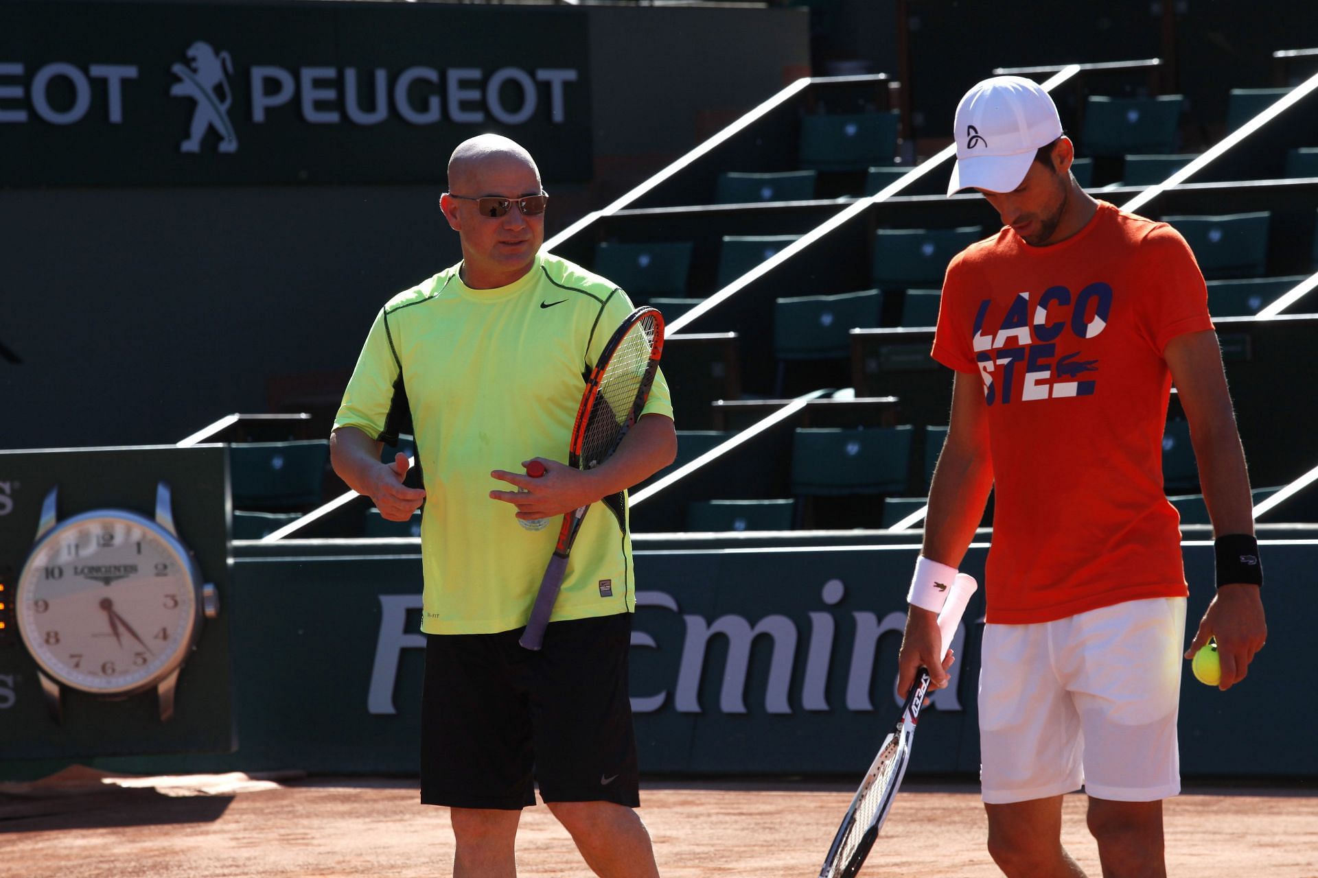 Andre Agassi and Novak Djokovic pictured at the 2017 French Open | Image Source: Getty
