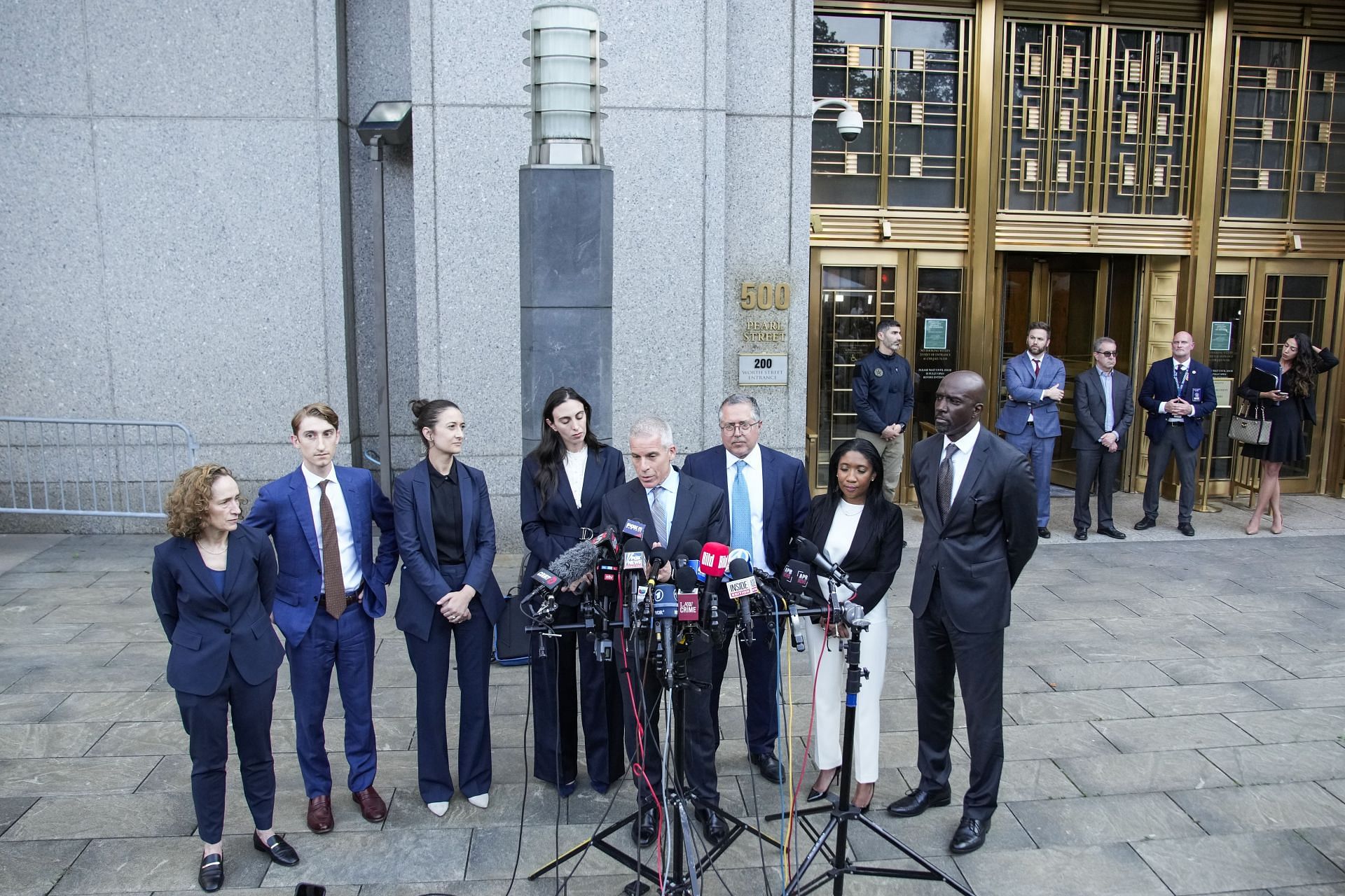 Combs&#039; legal team outside the Manhattan courthouse following his partial acquittal (Image via Getty Images)