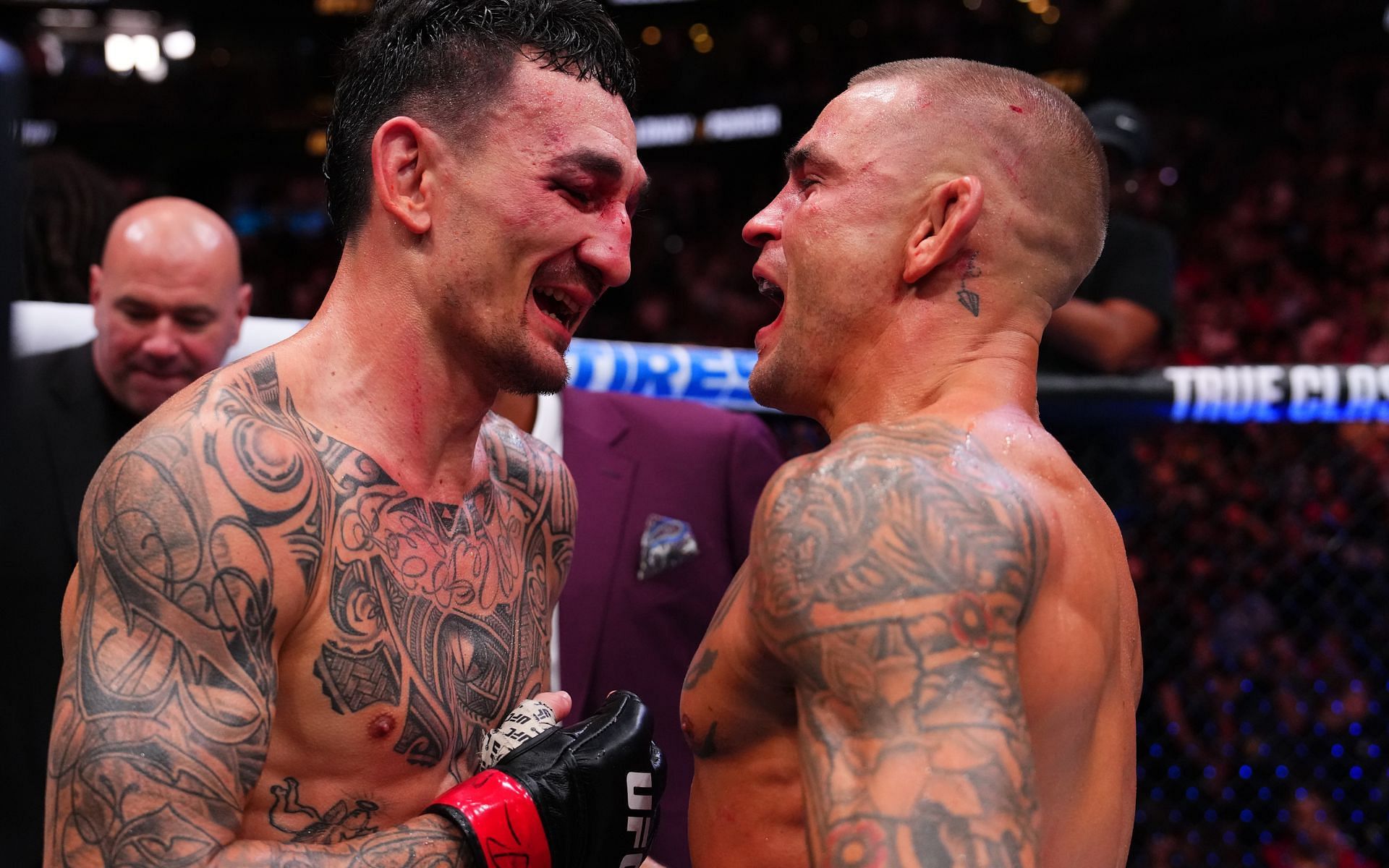 Max Holloway and Dustin Poirier after their fight at UFC 318. [Image courtesy: Getty]