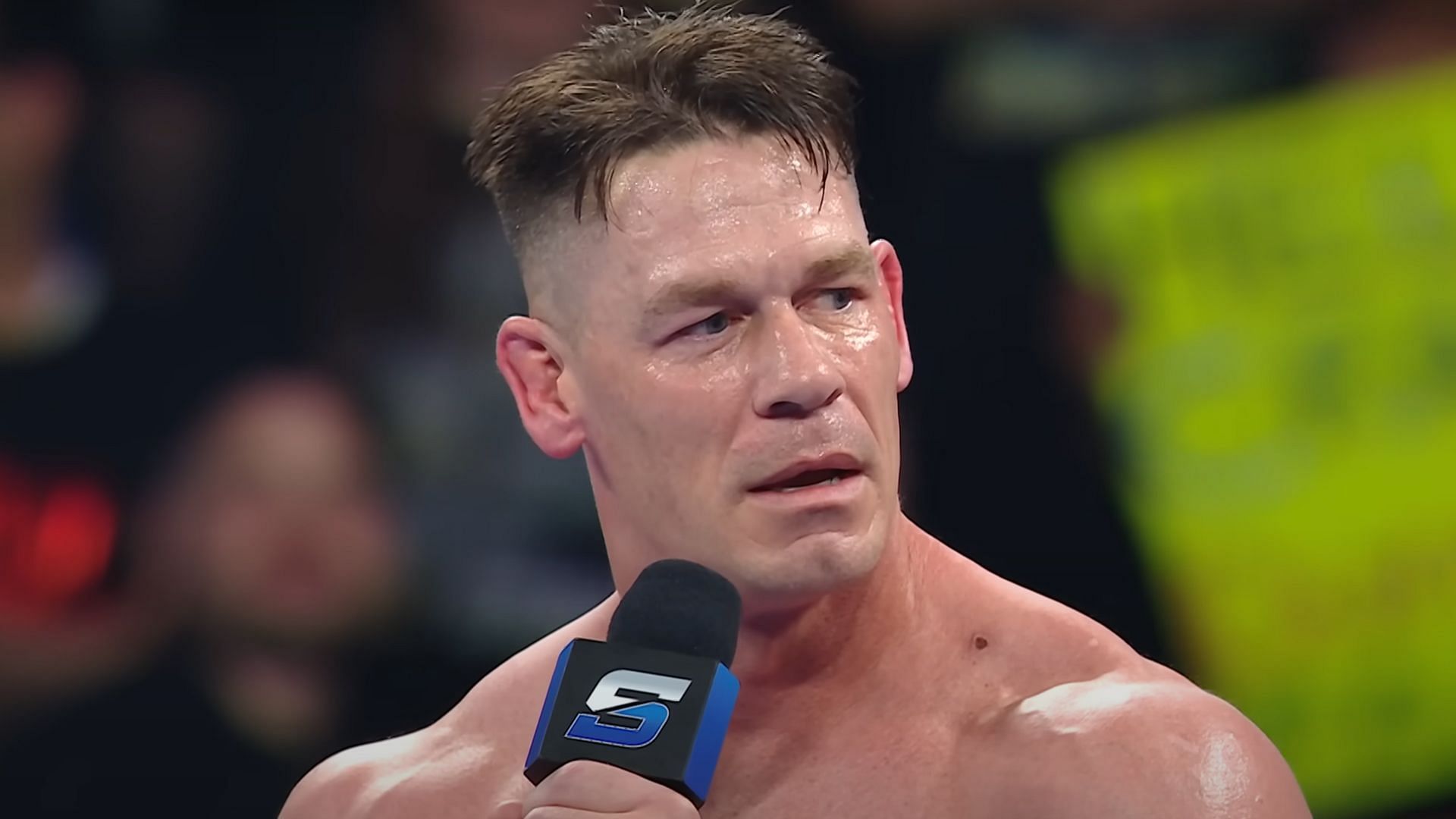 John Cena is the current Undisputed WWE Champion. [Photo credits: WWE on YouTube]