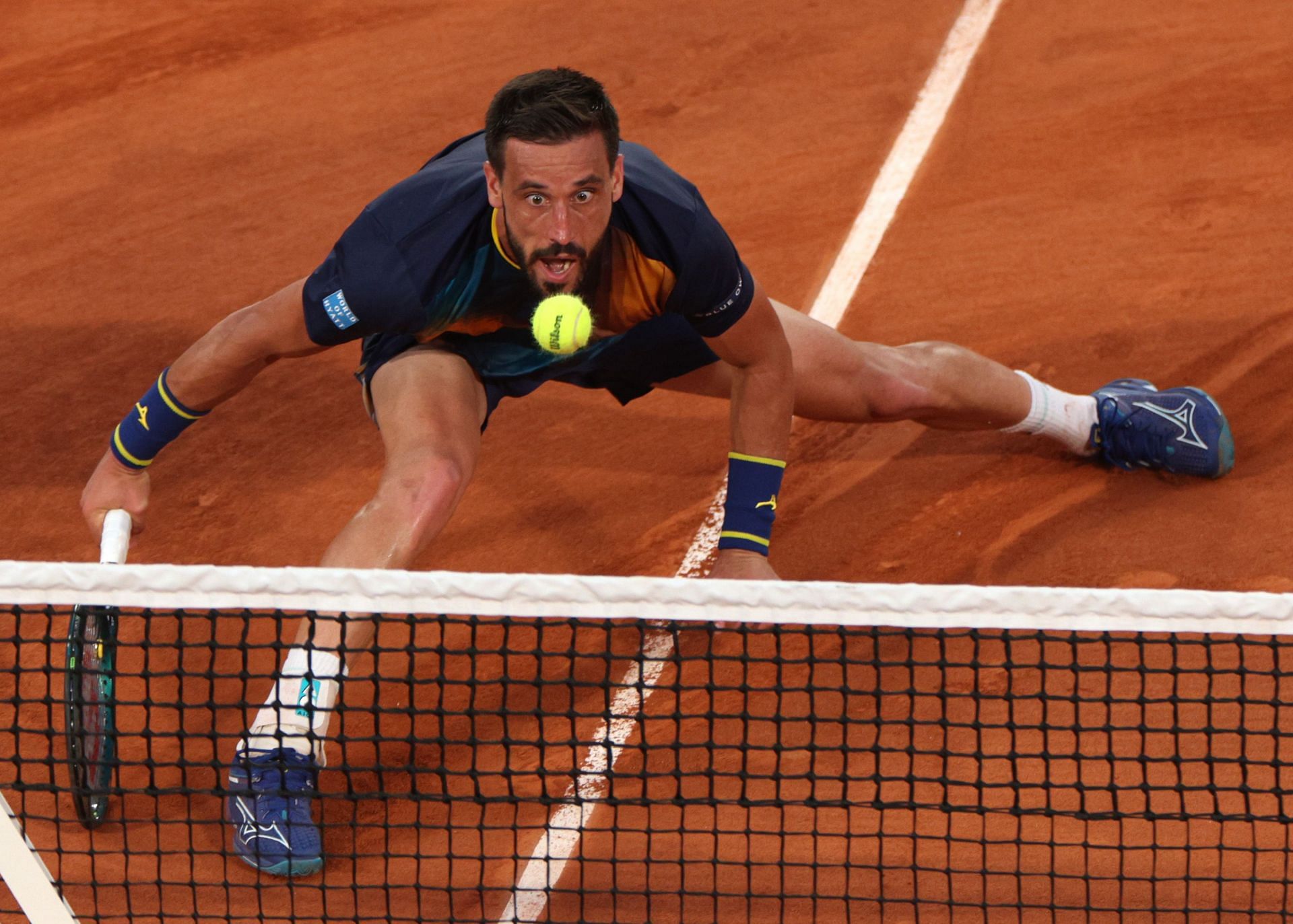 Damir Dzumhur tracks down a ball | Image Source: Getty