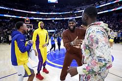 "Yeah he a Warrior": NBA fans lose it as LeBron James spotted dancing with Draymond Green at Bad Bunny's concert amid trade rumors