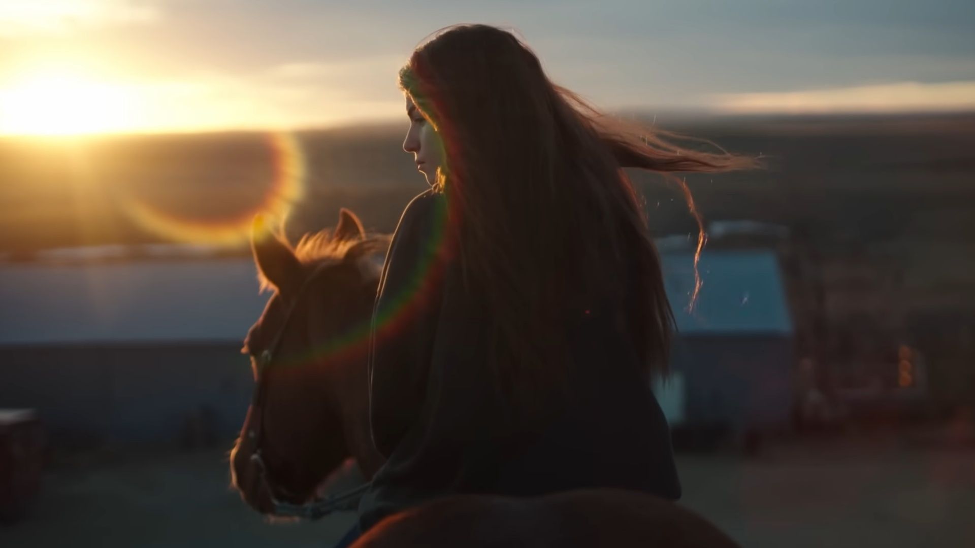 Porshia Zimiga on horseback at sunset in South Dakota, in a scene from East of Wall.