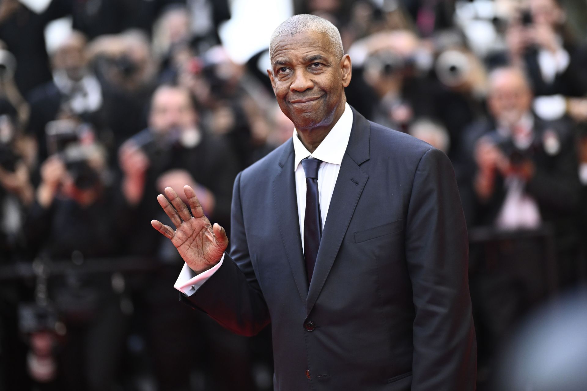 Denzel Washington attends the &quot;Highest 2 Lowest&quot; red carpet at the 78th annual Cannes Film Festival (Photo by Gareth Cattermole/Getty Images)