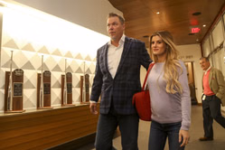Chipper Jones' wife Taylor turns up the glamor in backless baby pink dress while soaking up Italy's coastal beauty