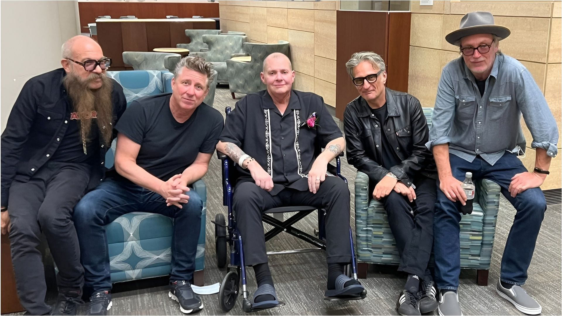 David Roach (middle) with his band members (Image via Facebook/David Roach)