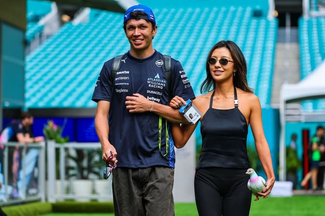 Alex Albon poses with partner Lily Muni He in picturesque setting: “The Dolomites got me rock hard”