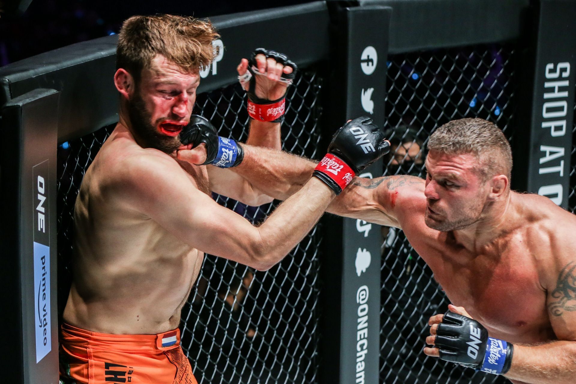 Anatoly Malykhin (right) darting into enemy with a piston-like right. [Image from ONE Championship]