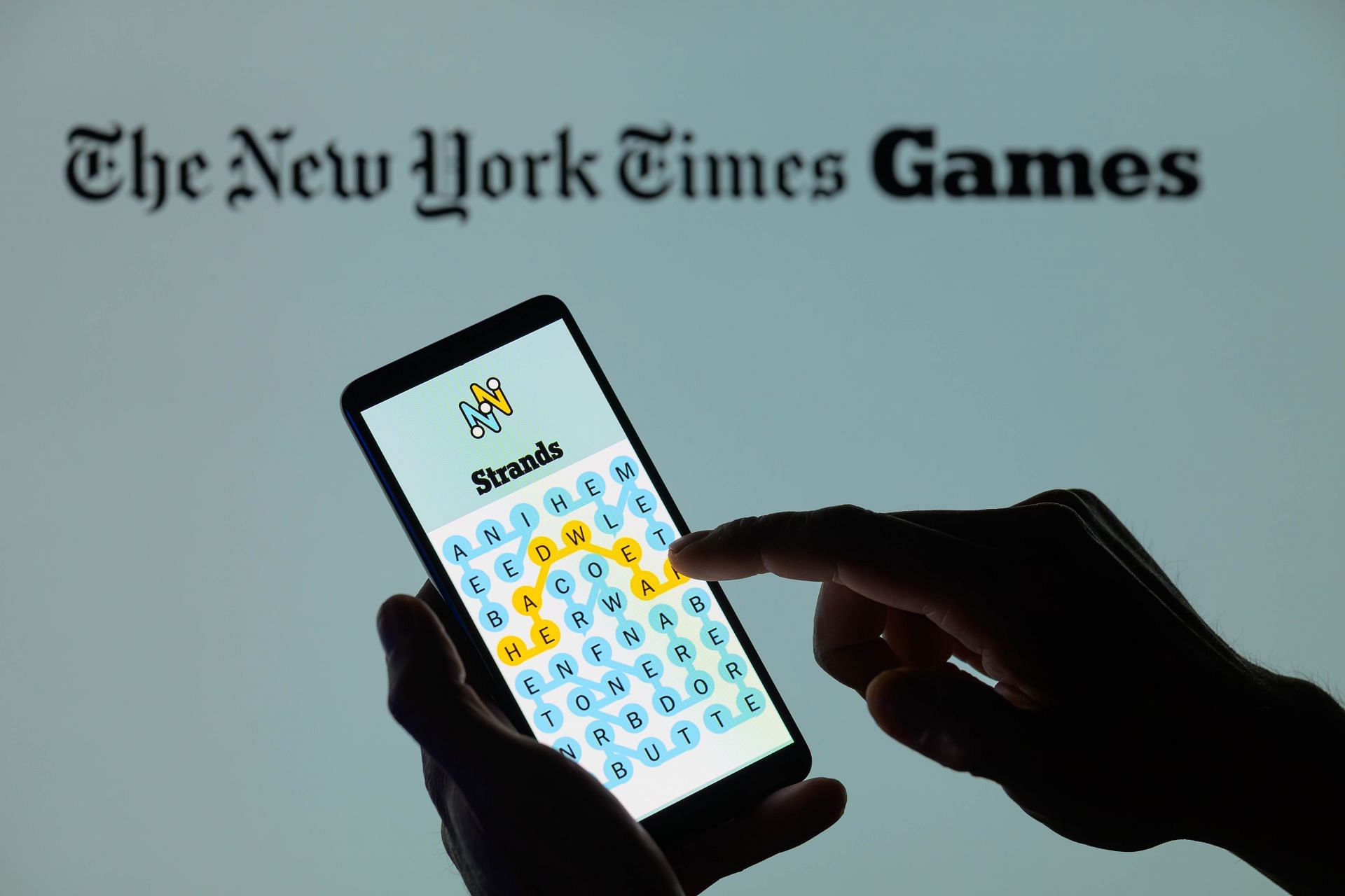 NYT Strands Game - Photo Illustration - Source: Getty