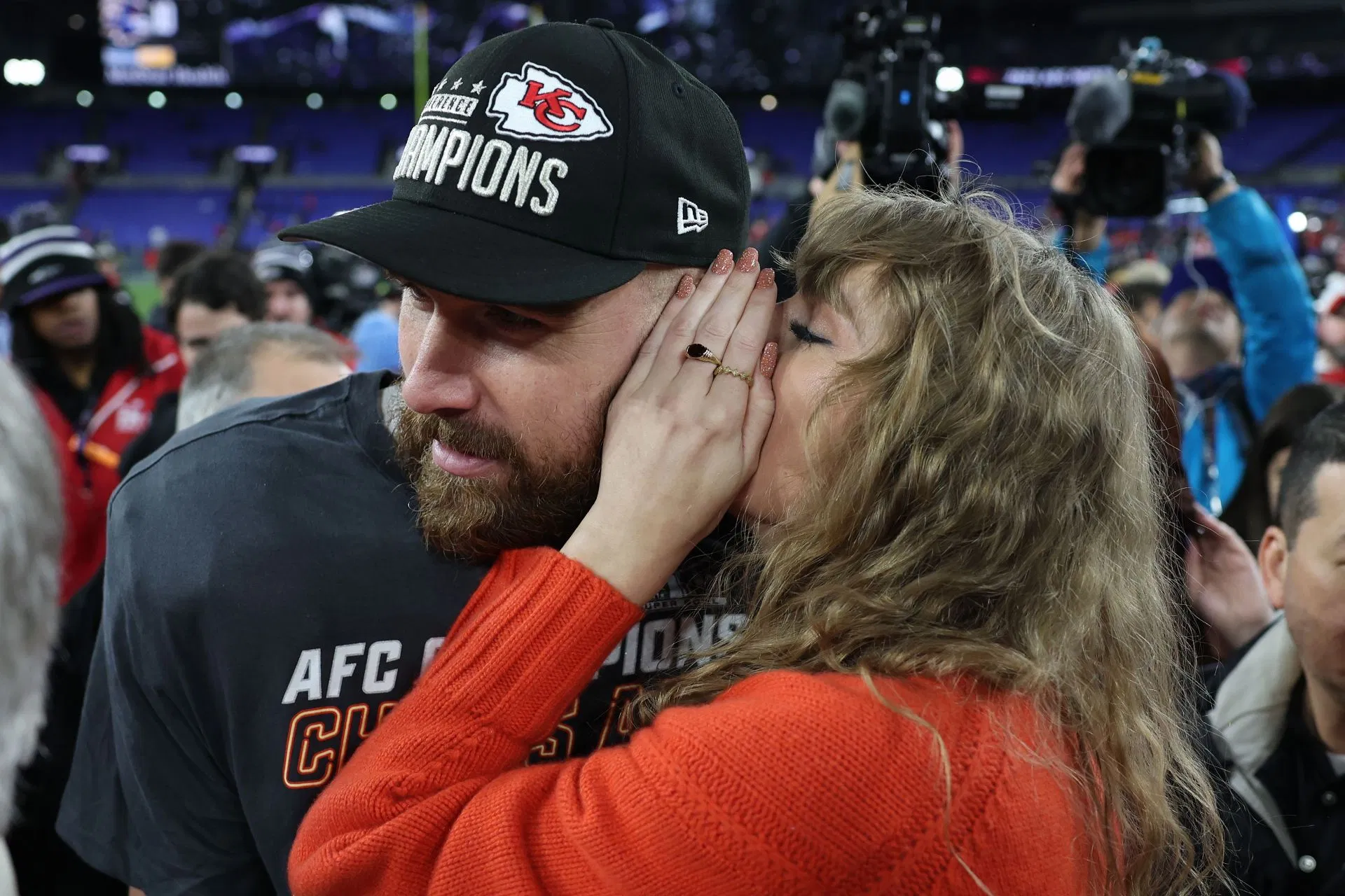 Travis Kelce and Taylor Swift at the AFC Championship game in 2024 (Image via Getty)
