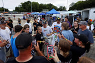 Dale Earnhardt Jr. with fans before the 2024 Hampton Heat at Langley Speedway. Source: Imagn