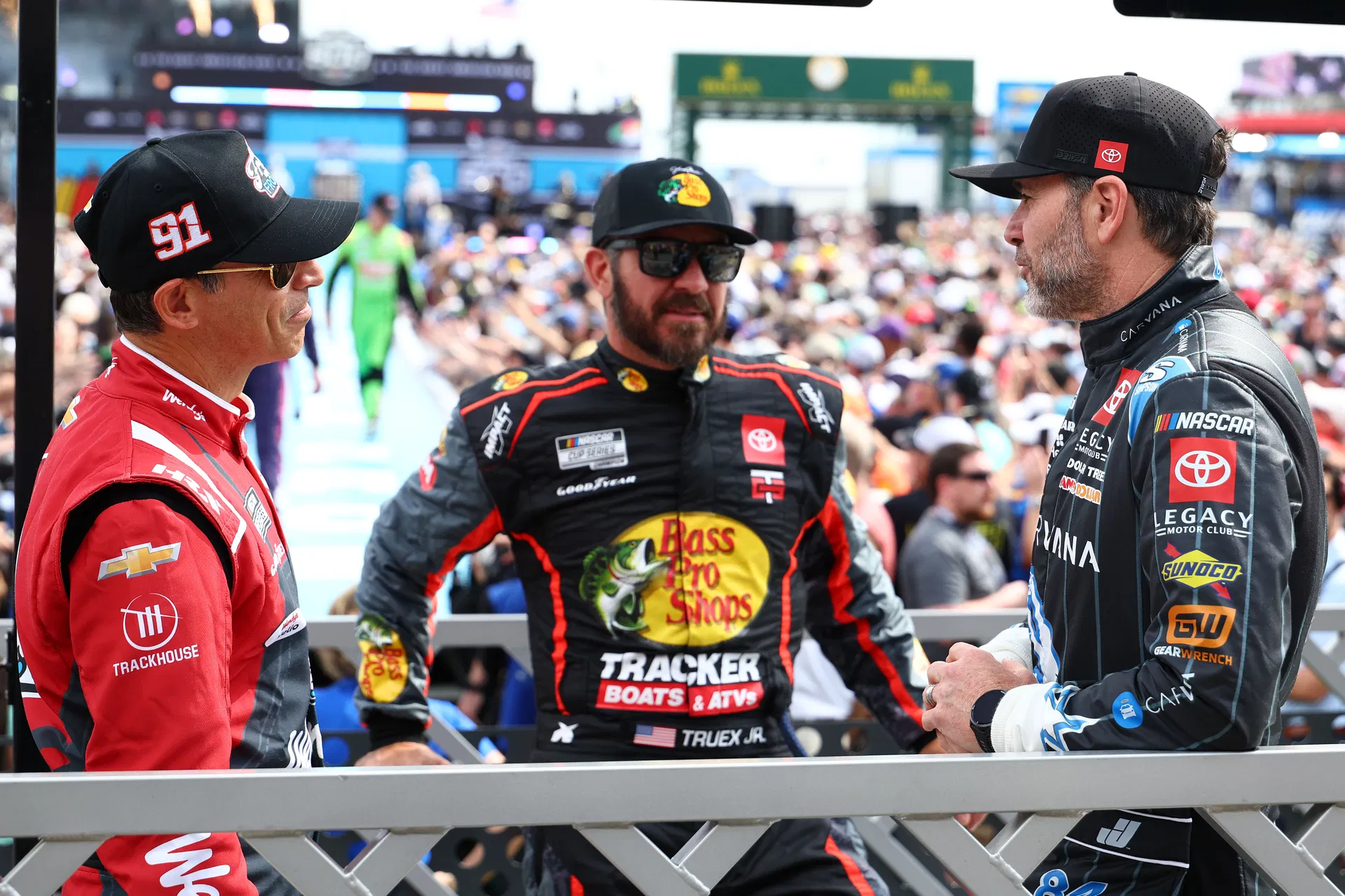 (L-R) Helio Castroneves, Martin Truex Jr., and Jimmie Johnson before the Daytona 500. Source: Imagn