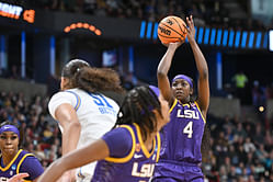 WATCH: LSU star Flau'jae Johnson channels her inner coach while putting little brothers through football drills