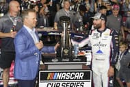 NASCAR Cup Series driver Ross Chastain (1) celebrates his win and receives a ring and a watch from track president Marcus Smith - Source: Imagn