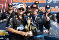 Austin Prock (R) with team owner John Force after winning the NHRA Virginia Nationals. Source: Imagn