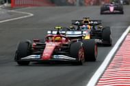 Max Verstappen chasing down Lewis Hamilton at the Hungarian Grand Prix - Source: Getty