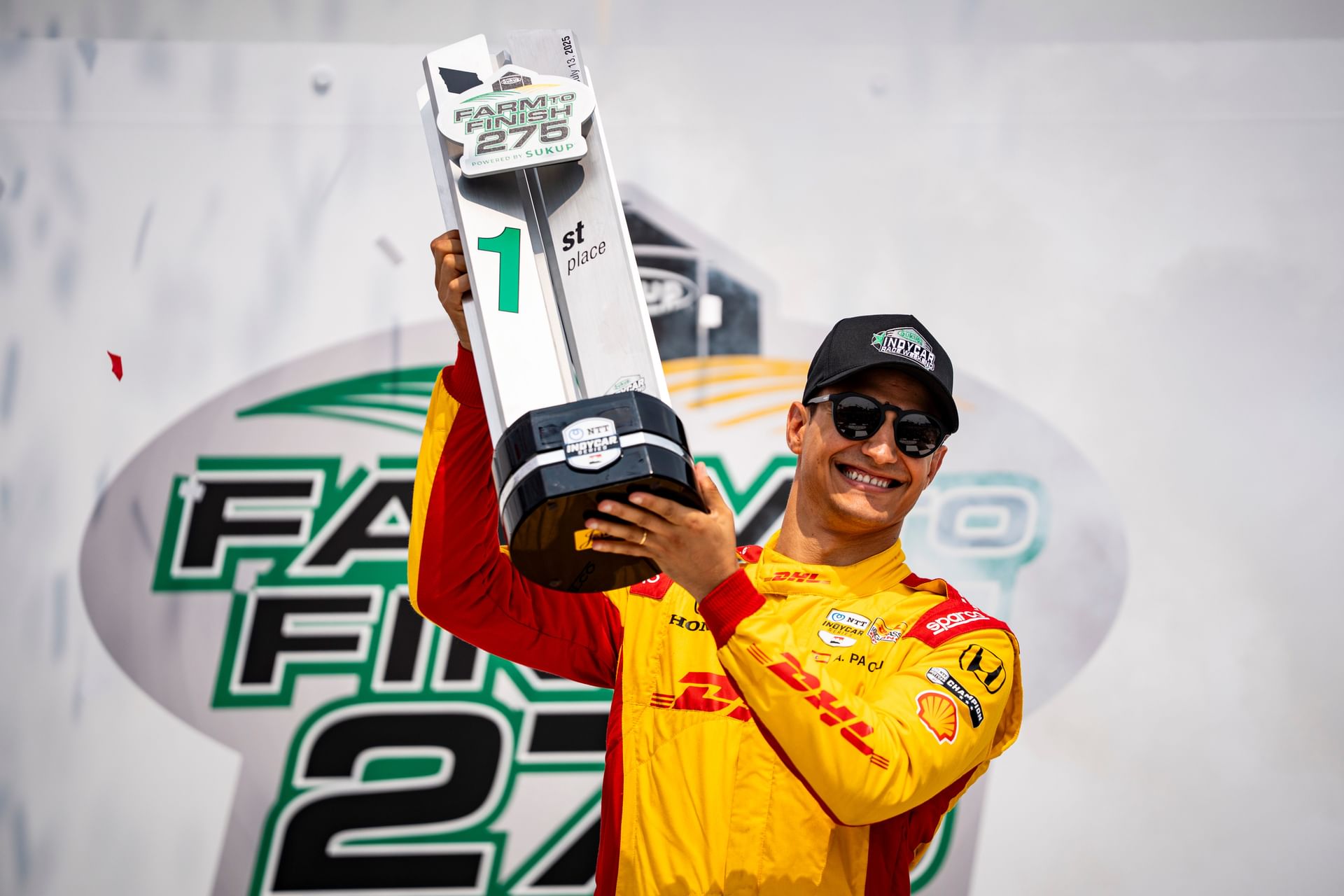 Alex Palou celebrates after the NTT IndyCar Series Farm to Finish 275. Source: Imagn
