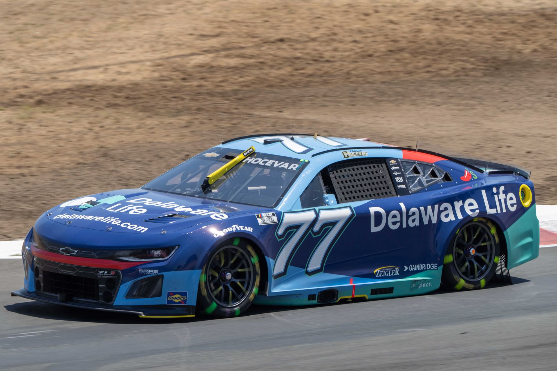 Carson Hocevar drives the #77 Chevrolet Camaro for Spire Motorsports - Source: Imagn