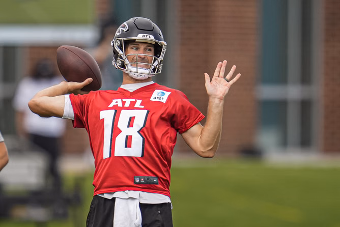 Amid Kirk Cousins trade rumors, his wife Julie makes 'fun visit' to Falcons camp celebrating QB's 14th season