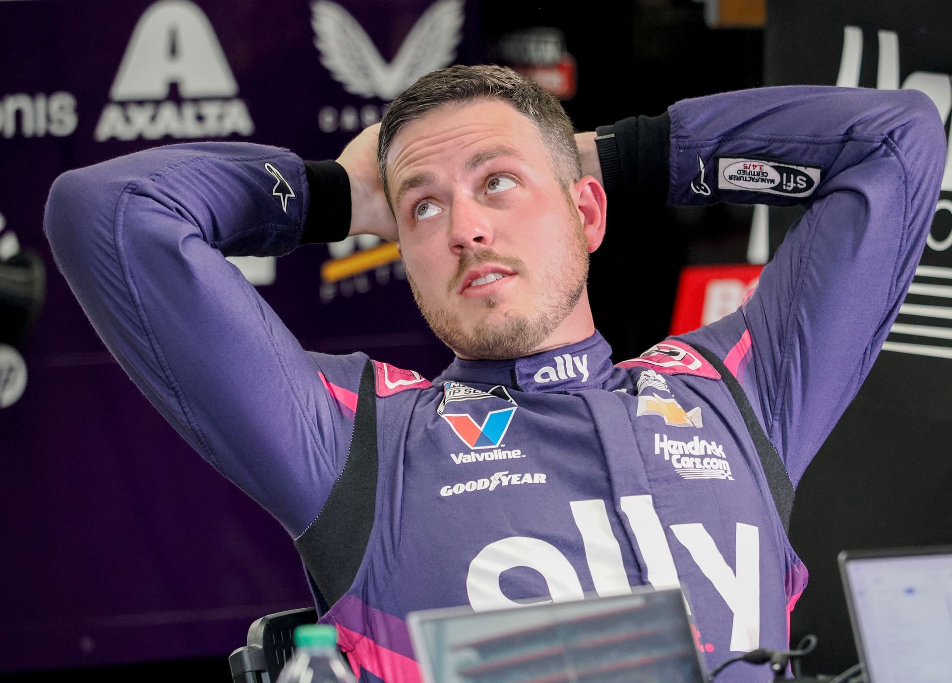 NASCAR Cup Series driver Alex Bowman sits in his garage ahead of the Brickyard 400. Source: Imagn