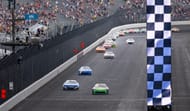Bubba Wallace (23) crosses the finish line in the Brickyard 400. Source: Imagn