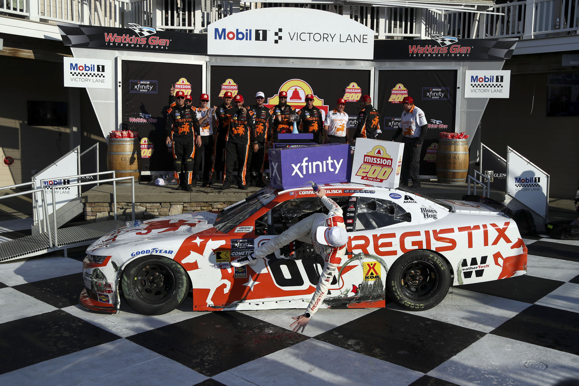 NASCAR Xfinity Series driver Connor Zilisch falls from his race car while celebrating in victory lane - Source: Imagn