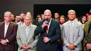 [Watch] WWE security pushes away a deranged fan for running up to Triple H