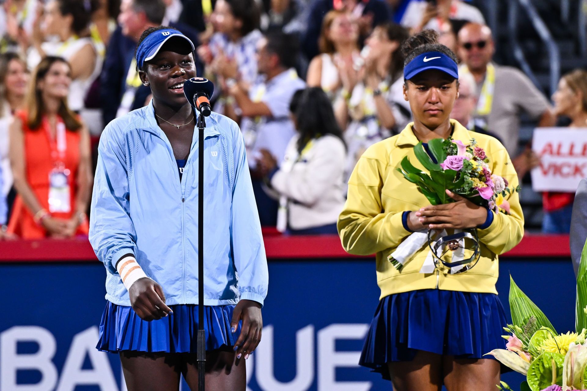 Victoria Mboko (left) delivers her speech after defeating Naomi Osaka (right) in the women&#039;s singles final of the 2025 National Bank Open (Source: Getty)